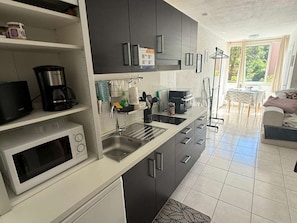 Fridge, microwave, coffee/tea maker, toaster