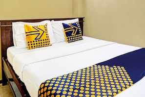 Economy Double Room | Laptop workspace, free WiFi, bed sheets - OYO 91588 Ananda Guest House Batu (Batu)