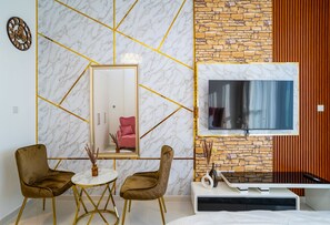Living area - Tanin - Wake Up To Dubai Skyline From This Stylish Studio (Dubai)