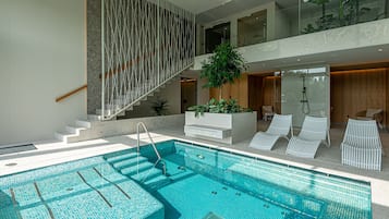 Indoor pool, seasonal outdoor pool, free pool cabanas, pool umbrellas