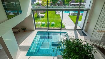 Indoor pool, seasonal outdoor pool, free pool cabanas, pool umbrellas