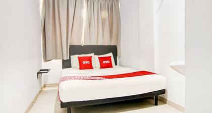 OYO 90310 Cosmo Harmoni