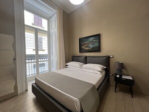 Quarto superior | Frigobar, cofres nos quartos, escrivaninha, Wi-Fi de cortesia