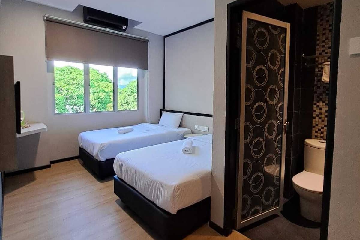 Habitación estándar con 2 camas individuales | Wifi gratis y ropa de cama