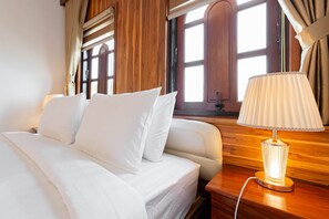 In-room safe, desk, laptop workspace, blackout drapes - LuangPrabang Centre Hotel (Luang Prabang)