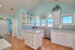 Fridge, microwave, stovetop, dishwasher - Experience oceanfront luxury at Sea for Miles in Oak Island, NC, with 5 bedrooms! (Oak Island)