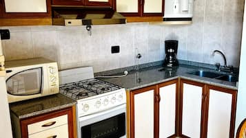 Apartment | Private kitchen | Full-size fridge, microwave, oven, stovetop