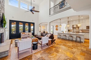 Smart TV, fireplace, books, offices