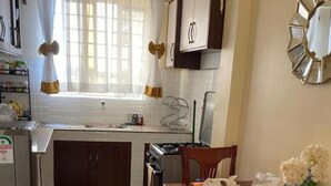 Apartment, 2 Bedrooms | Private kitchen | Fridge, microwave, oven, stovetop - J&J Homes Nakuru (Nakuru)