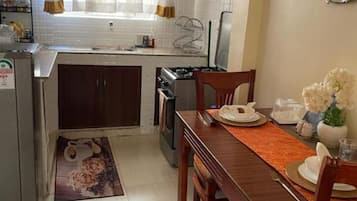 Apartment, 2 Bedrooms | Private kitchen | Fridge, microwave, oven, stovetop