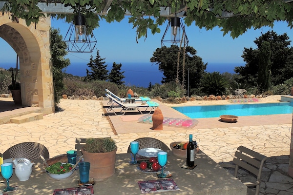 7. The Buoys shaded dining area and sea view.