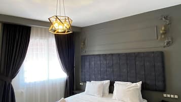 2 habitaciones, ropa de cama de alta calidad, minibar y escritorio