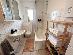 Hair dryer, bidet, towels, soap
