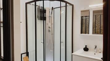 Standard Double Room | Bathroom | Shower, hair dryer, towels, soap