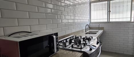 Apartment | Private kitchen | Full-size fridge, microwave, oven, blender