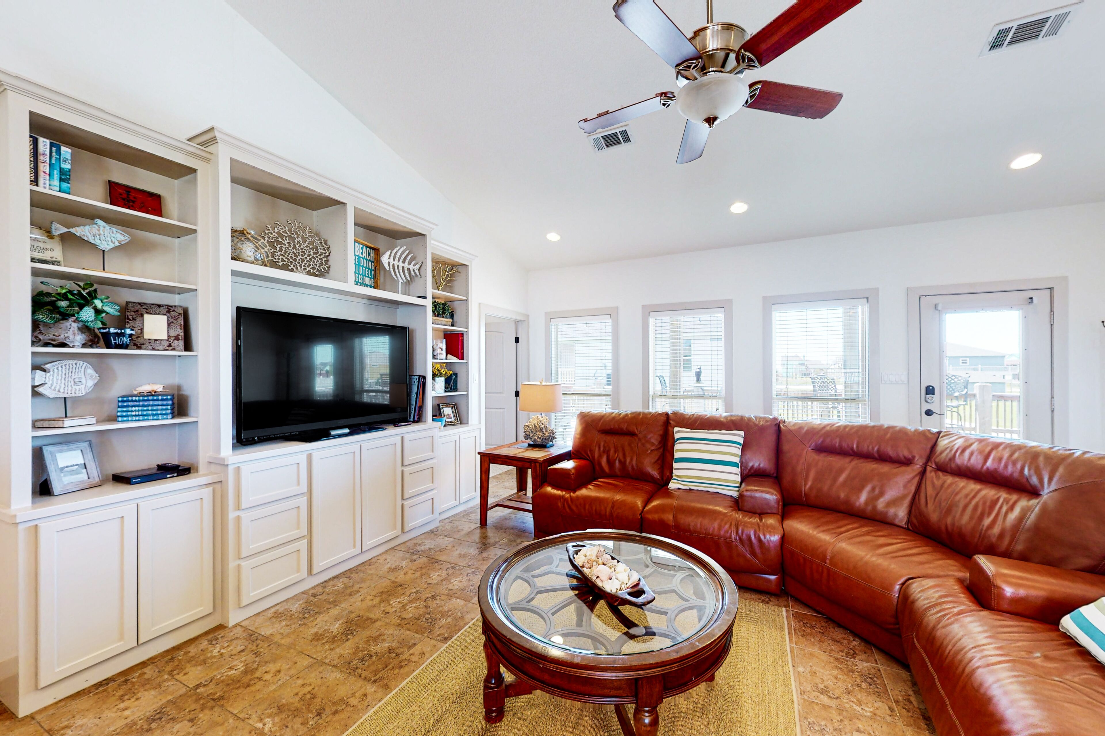 Inviting house with private hot tub, deck, fenced yard, W/D, & AC