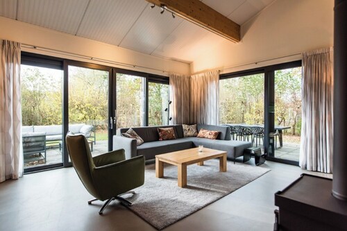 Modern house Juffer with terrace on south. Near woods and outdoor swimming pool.