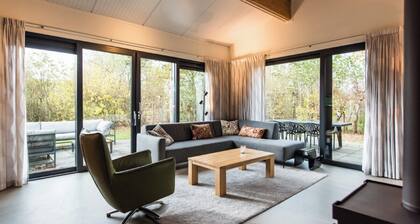 Modern house Juffer with terrace on south. Near woods and outdoor swimming pool.