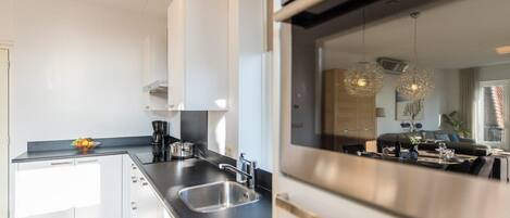 Fridge, microwave, dishwasher, coffee/tea maker