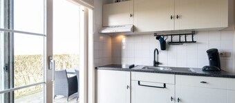 Friese Antillen is a courtyard of 8 homes near of the beach and village Hollum.