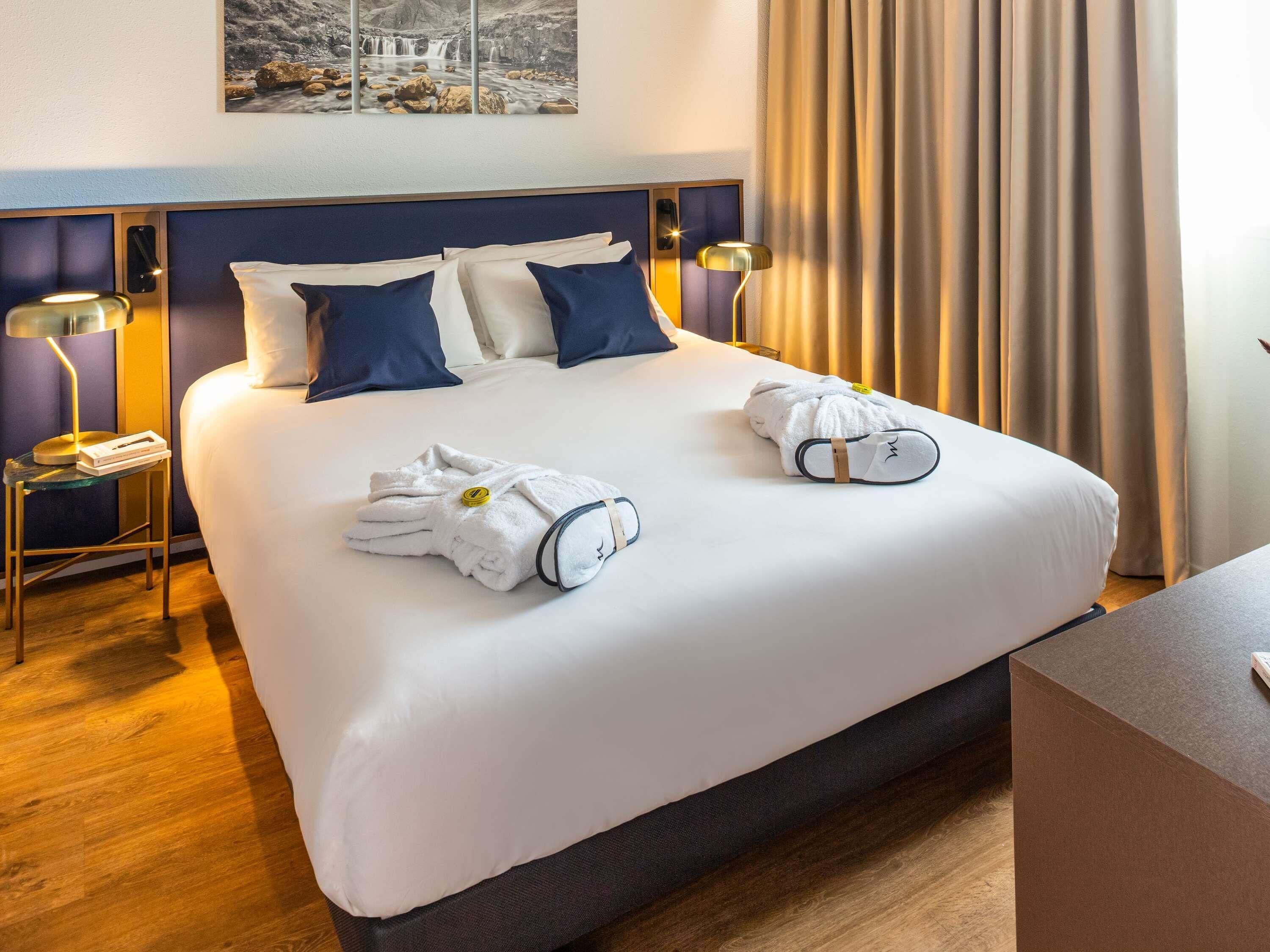 Familie suite | Luxe beddengoed, Select Comfort-bedden, een kluis op de kamer