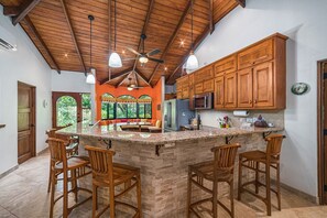 Fridge, microwave, oven, stovetop - Exquisite 2BDR, 2BTH Home - Gated Community - Steps from Luxurious Amenities (Playa Junquillal)