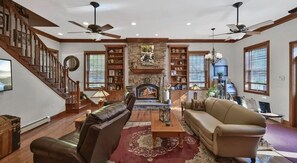 Living area - The spacious lakefront house features kayaks and a boat ramp. (East Stroudsburg)