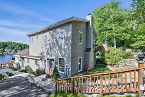 Exterior - The spacious lakefront house features kayaks and a boat ramp. (East Stroudsburg)