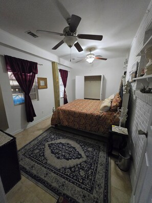 1 bedroom, desk, bed sheets