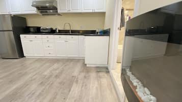 Fridge, microwave, coffee/tea maker, toaster