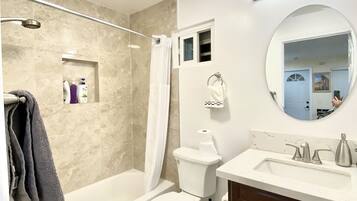 Hair dryer, towels, soap, shampoo