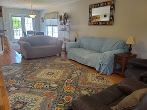 Living area - Enjoy sunsets overlooking the marsh from the privacy of the front porch (Murrells Inlet)
