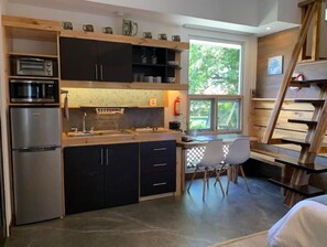 Fridge, microwave, stovetop, coffee/tea maker