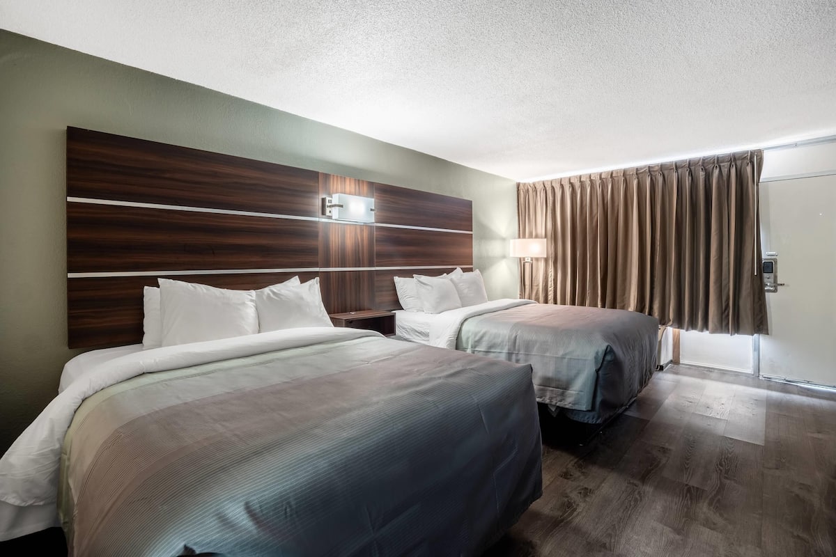 Premium bedding, memory-foam beds, desk, blackout curtains
