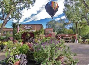 A building with a sign that reads "El Paso." - Location! Location! Amazing *Hidden Gem* -NE Heights! Family and pet friendly 🐶  (Albuquerque)