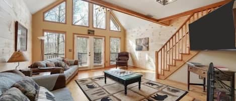 Smart TV, chimenea, videojuegos, futbolito