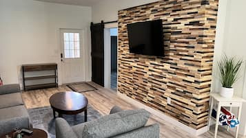 Smart TV, fireplace, video games, foosball