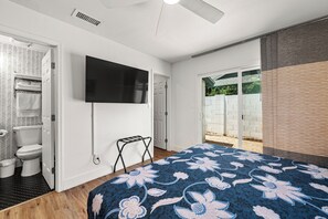 1 bedroom, desk, iron/ironing board, travel crib