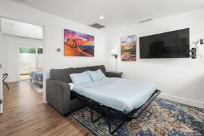 1 bedroom, desk, iron/ironing board, travel cot