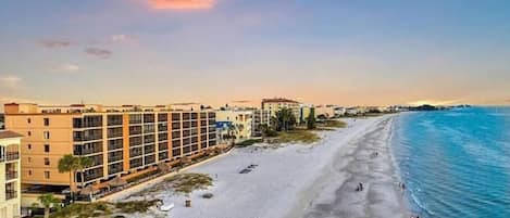 On the beach, sun loungers, beach towels