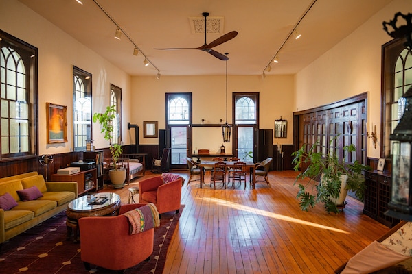 The former sanctuary is light-filled with spacious living and dining areas