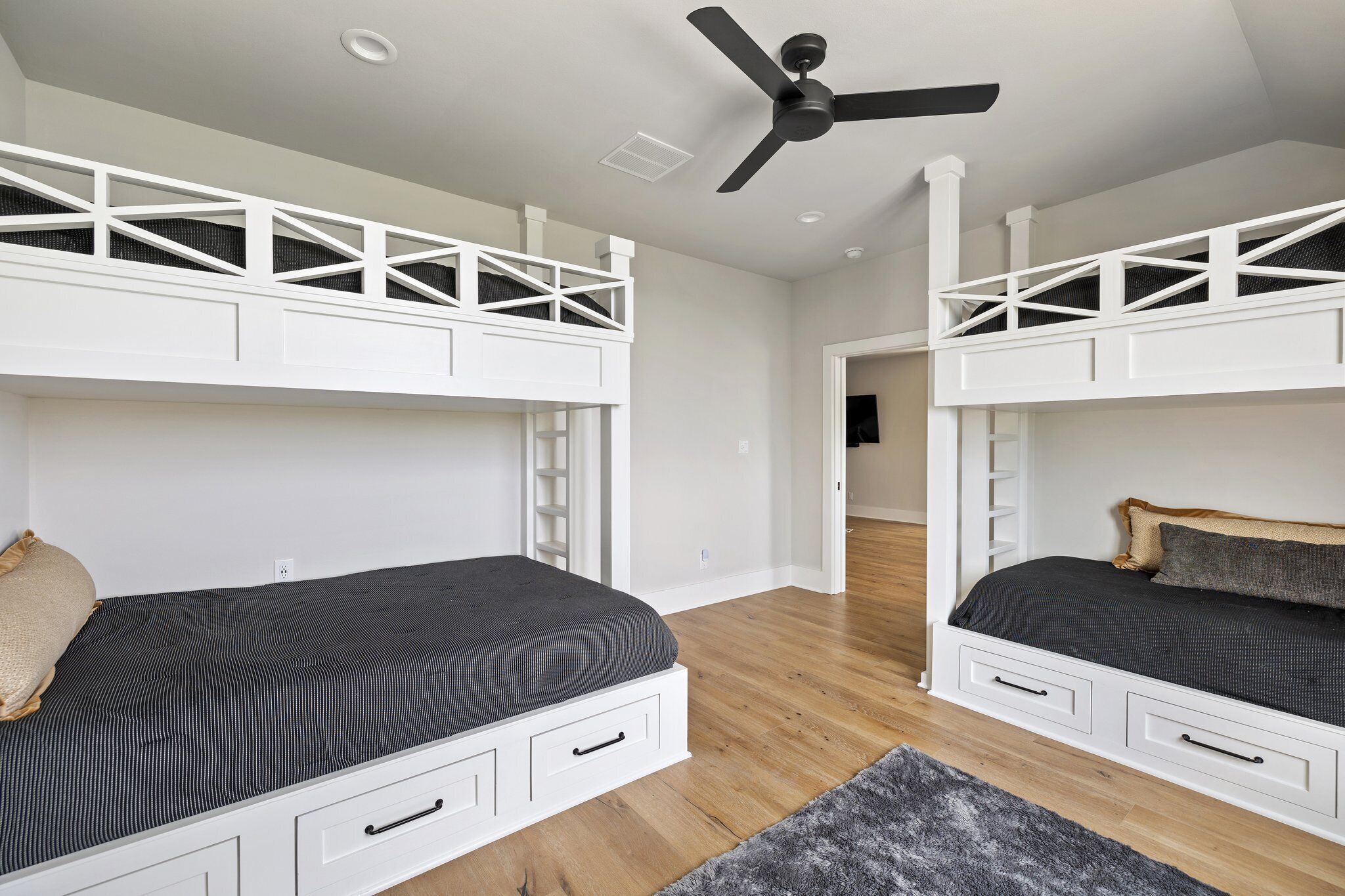 1 Queen and 3 Twin bunks; built-in drawers and USB wall plugs.