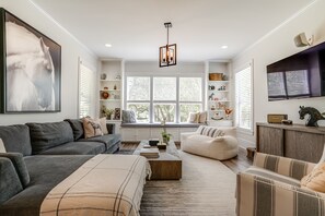 Smart TV, fireplace, video games, foosball
