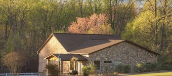 Lake front 2 cottages on private 11 acres: dock, deck, wiffleball, & more