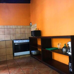 Basic Triple Room | Private kitchen | Full-size fridge, microwave, coffee/tea maker, rice cooker
