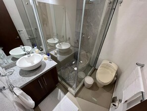Shower, towels, soap, shampoo