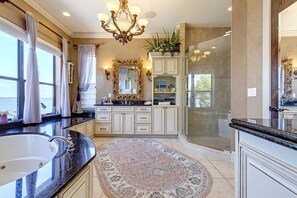 Jetted bath, hair dryer, towels, soap