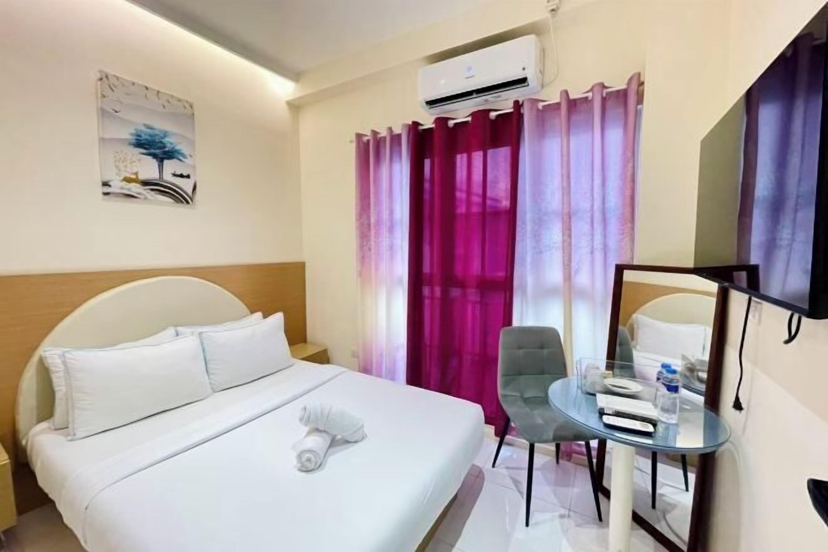 Premium bedding, Select Comfort beds, desk, laptop workspace