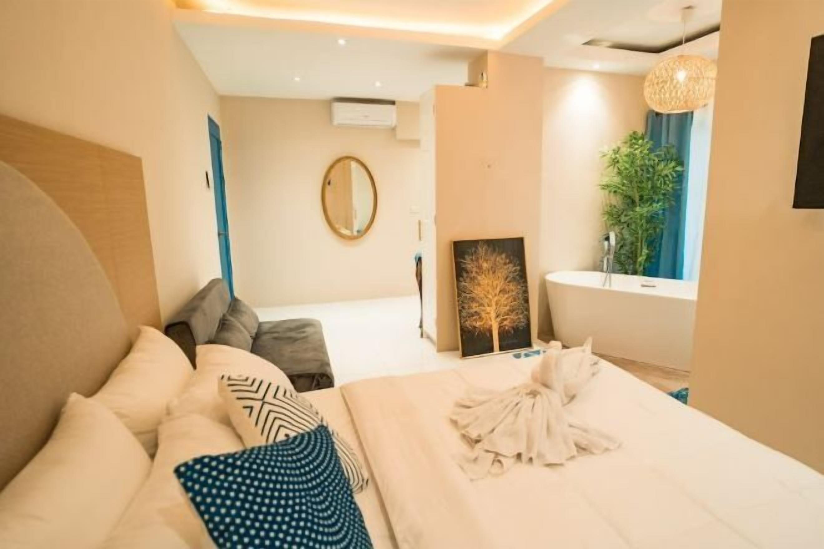 Premium bedding, Select Comfort beds, desk, laptop workspace