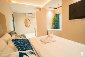 Superior suite | Luxe beddengoed, Select Comfort-bedden, een bureau, een laptopwerkplek